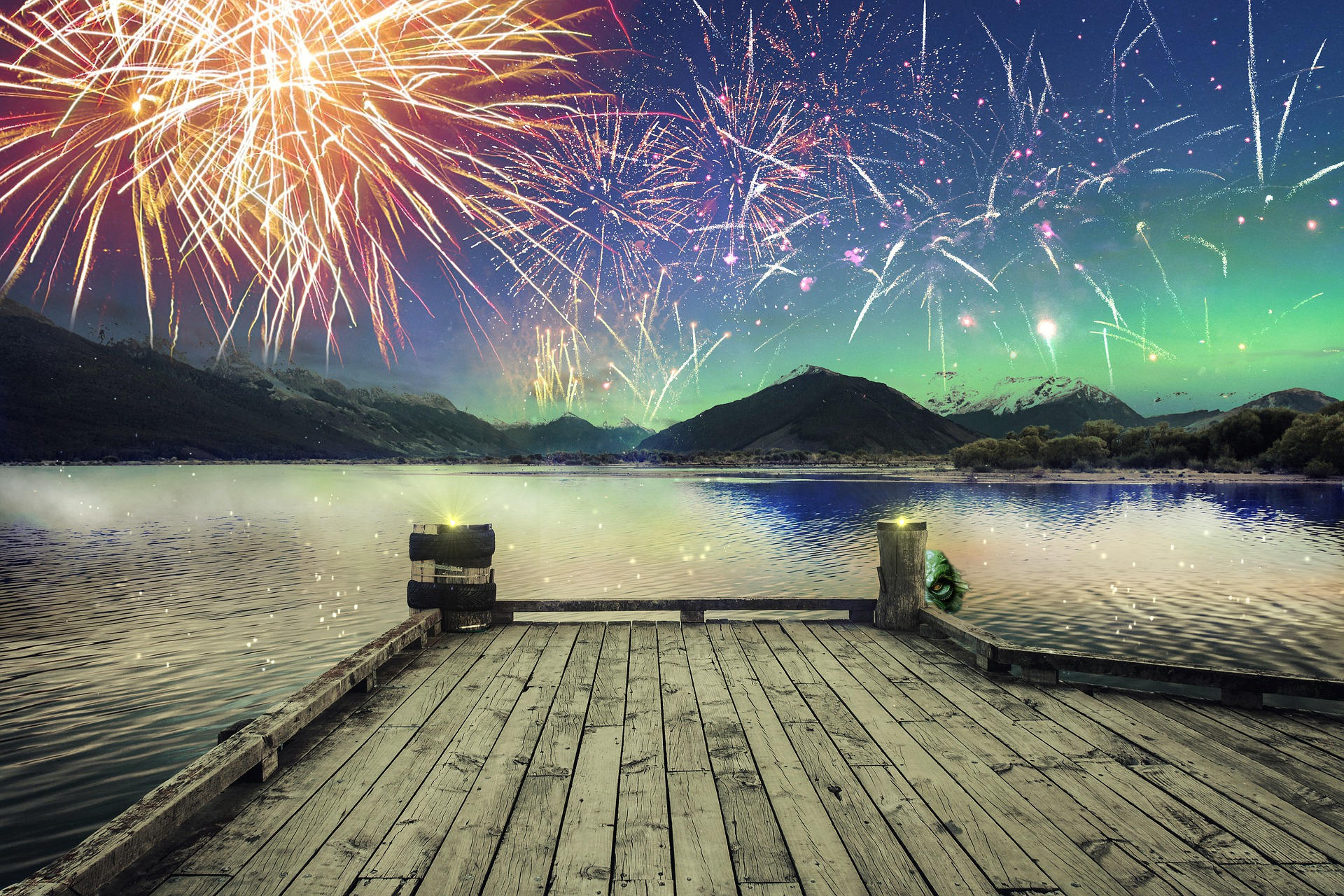 A reptilian humanoid lake monster lurks at a boat dock on Luminary Lake under the skies lit with fireworks on Independence Day!