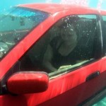Woman Trapped In Car Underwater